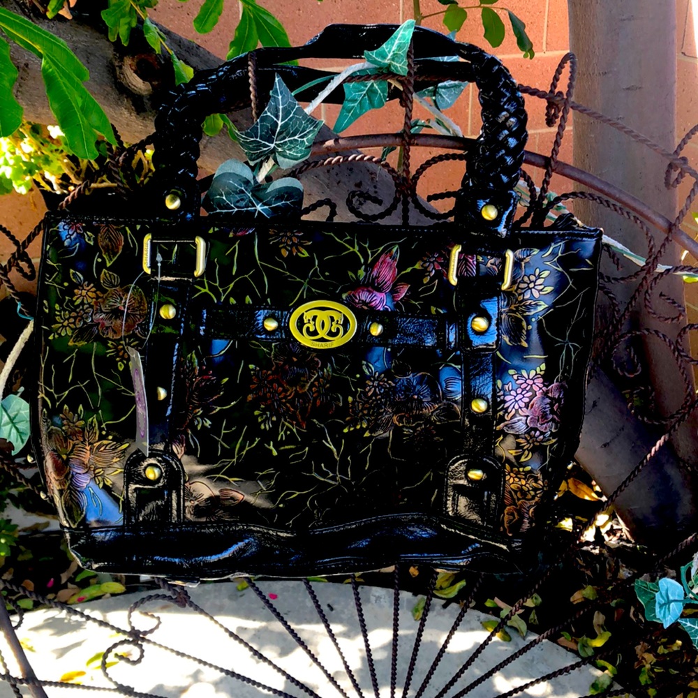Purse with mini purse and makeup bag inside.
